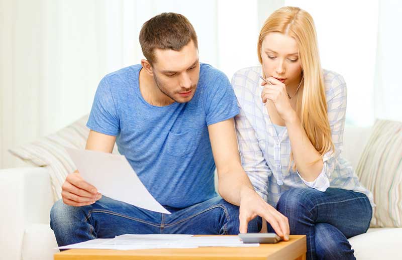 couple-budget couple reviewing their finances