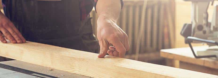 carpenter using wood